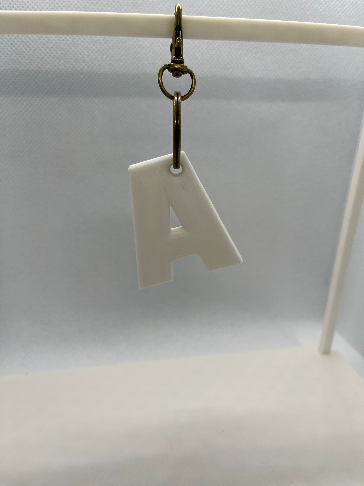 White A Keyring with brown lobster clasp
