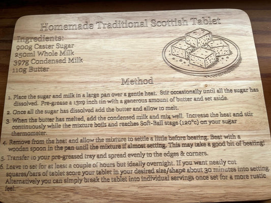 Wooden board with recipe for homemade traditional Scottish tablet on a wooden surface