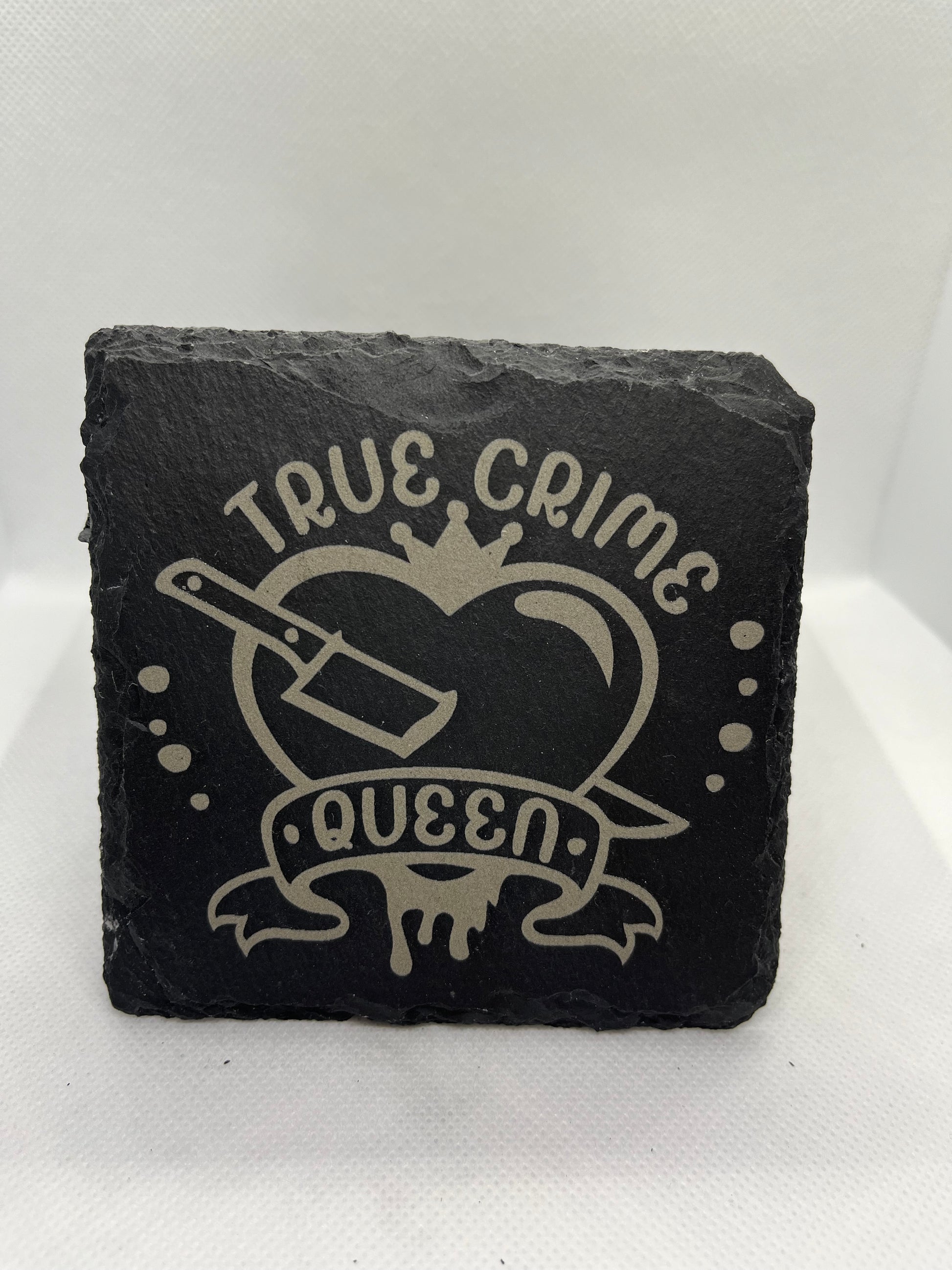 Black slate coaster with 'True Crime Queen' design on a white background