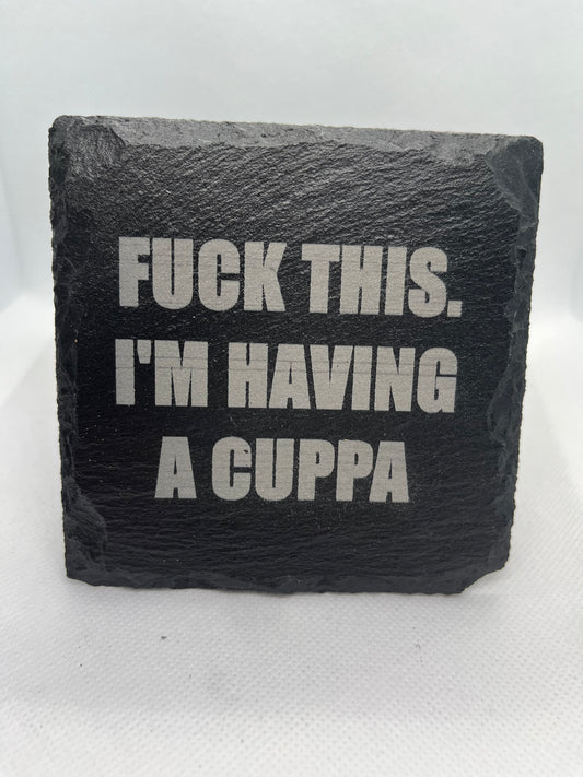Slate coaster with printed text on a white background